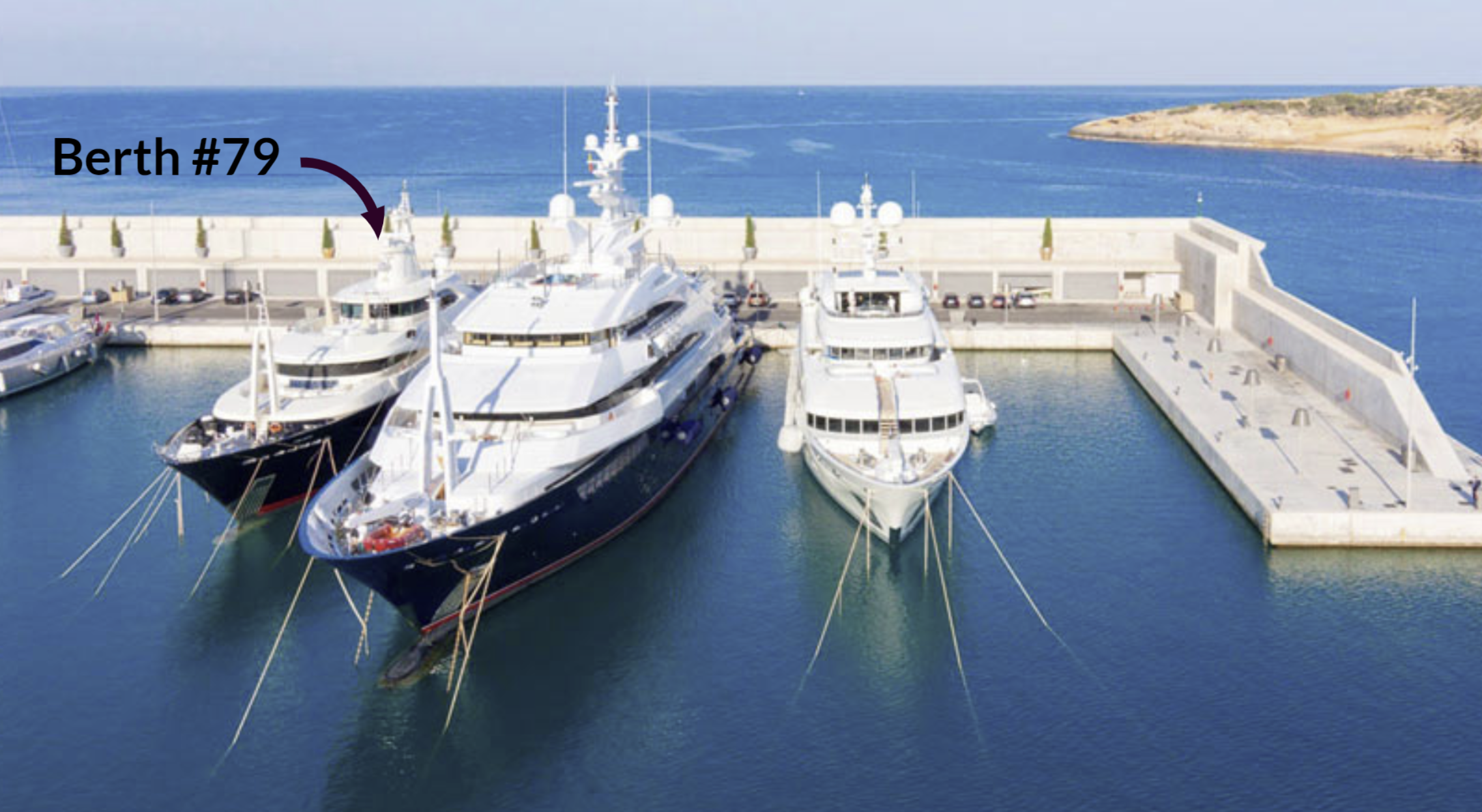 Three luxury yachts docked at a marina, with an arrow pointing to "Berth #79."