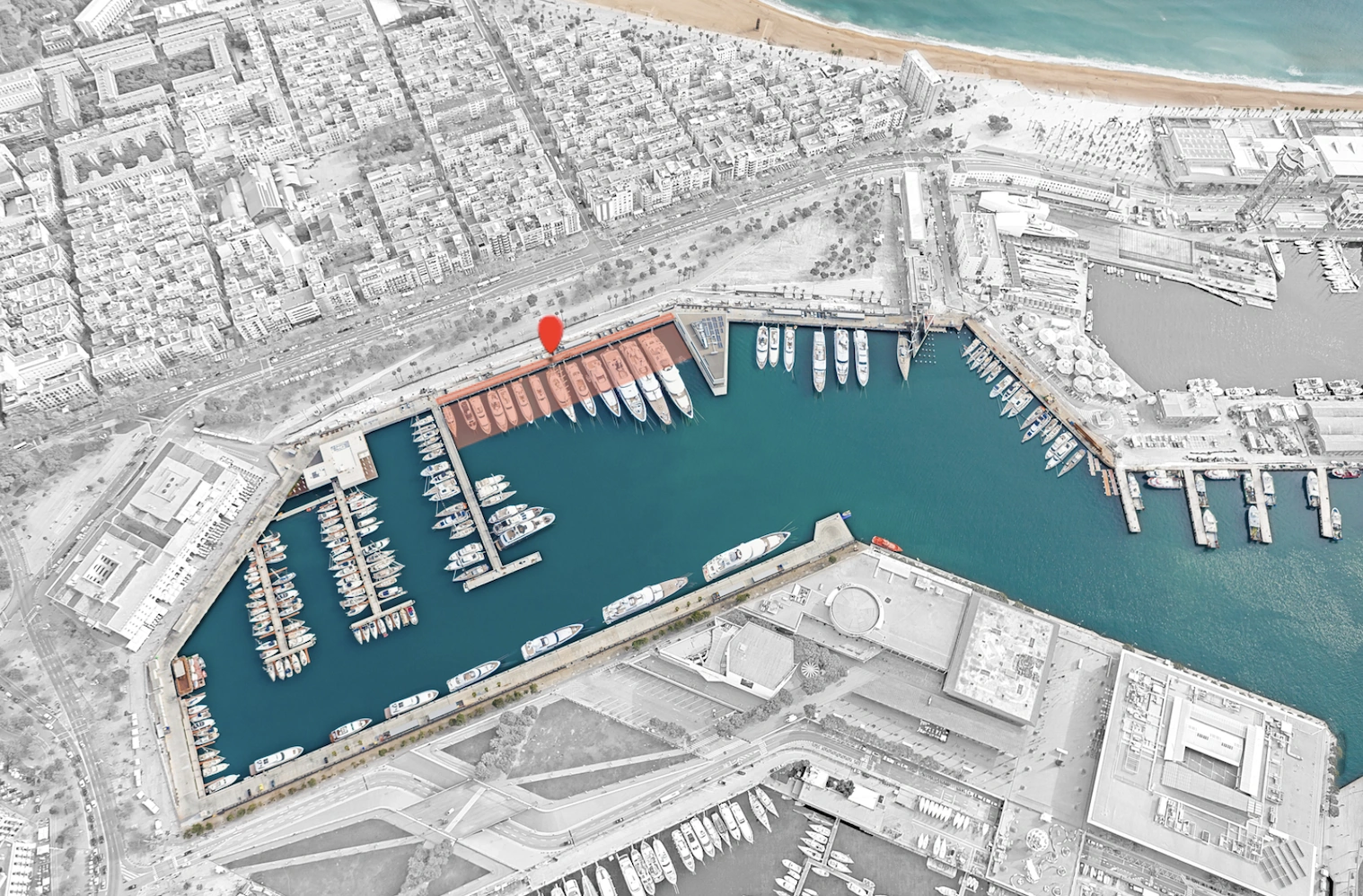 Aerial view of MPV – Moll de la Barceloneta in Barcelona, with highlighted superyacht berths and a location marker.