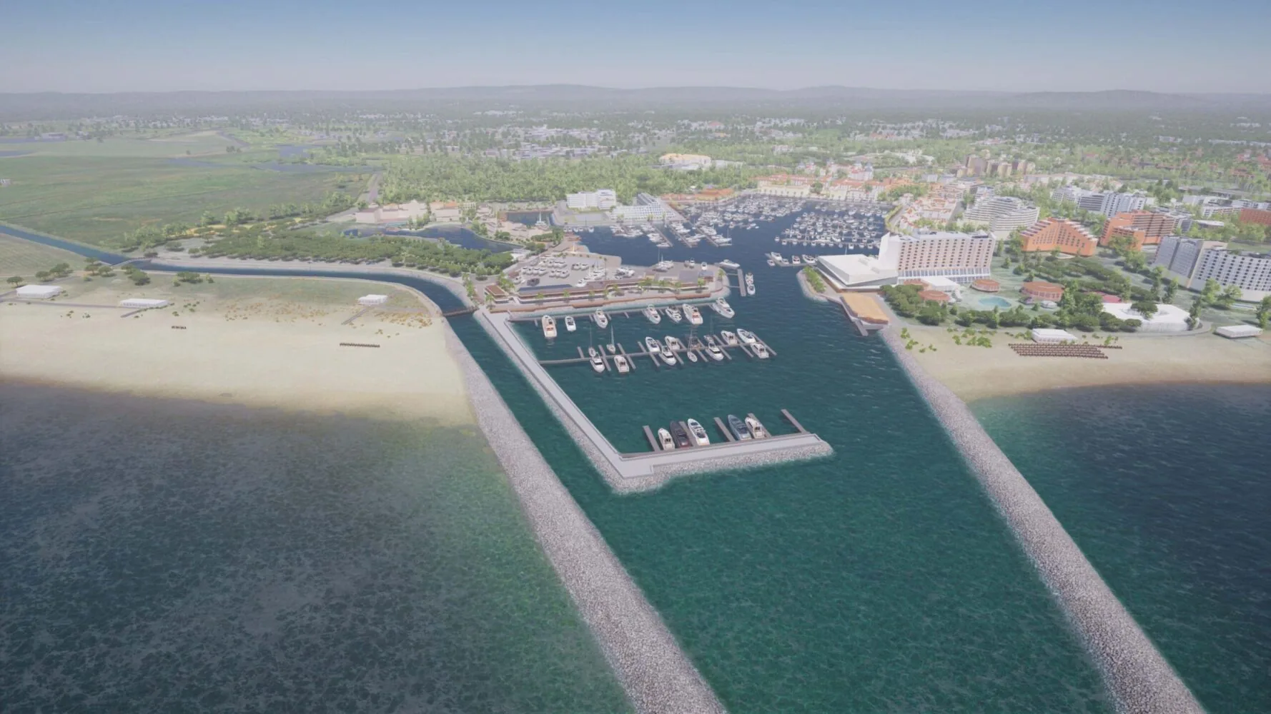 Aerial view of a marina with docks and boats near a sandy beach and a developed coastal area.