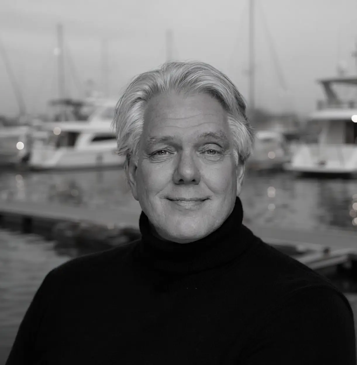 Henk van Egmond owner of direct Berth with Marina in background